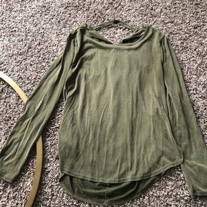 Francesca’s green long sleeve top